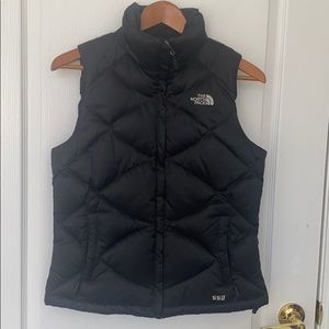 North face vest. Black. Quilted. Fitted